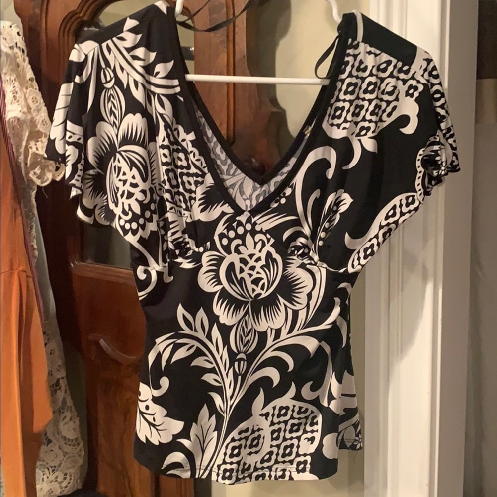 Floral B&W print shirt.